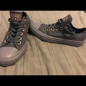 Blue-grey converse with gold decal